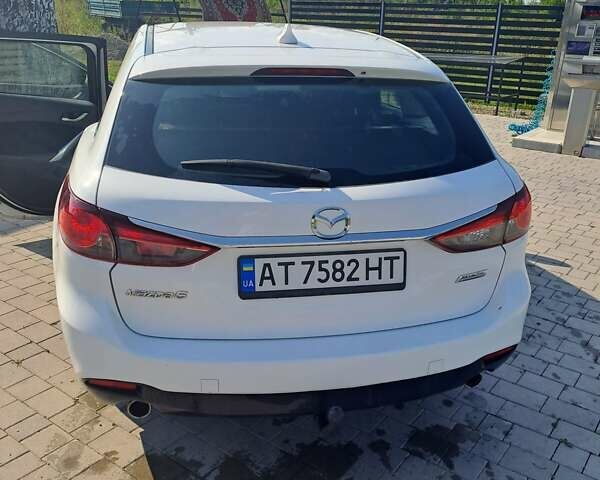 Білий Мазда 6, об'ємом двигуна 2.19 л та пробігом 253 тис. км за 11400 $, фото 8 на Automoto.ua