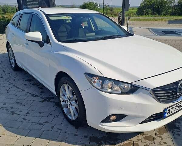 Білий Мазда 6, об'ємом двигуна 2.19 л та пробігом 253 тис. км за 11400 $, фото 3 на Automoto.ua