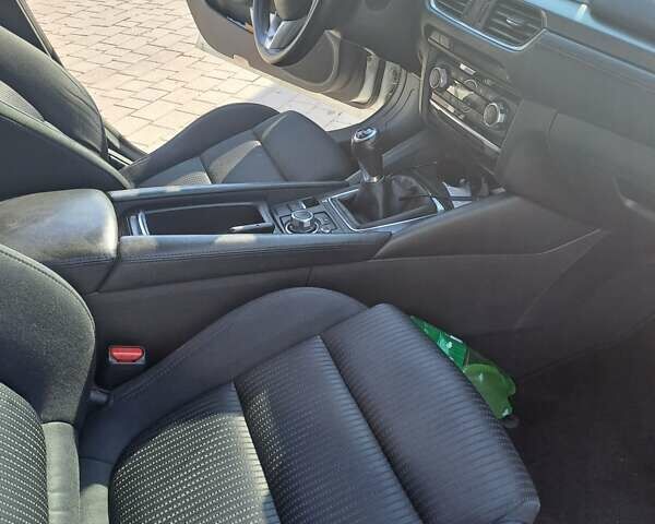 Білий Мазда 6, об'ємом двигуна 2.19 л та пробігом 253 тис. км за 11400 $, фото 10 на Automoto.ua