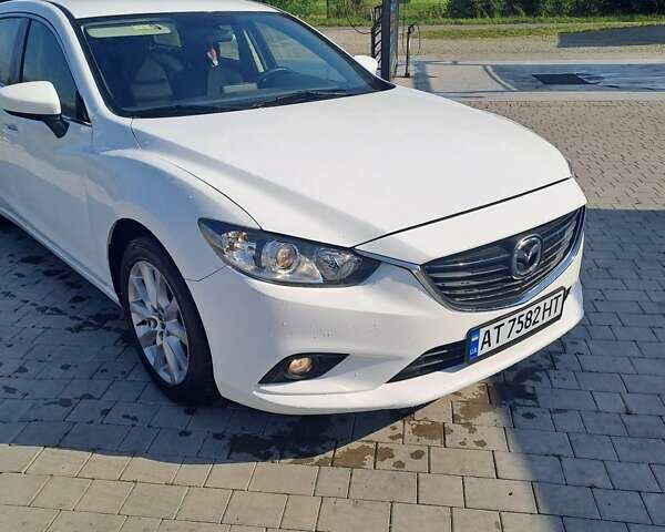 Білий Мазда 6, об'ємом двигуна 2.19 л та пробігом 253 тис. км за 11400 $, фото 4 на Automoto.ua
