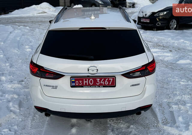 Білий Мазда 6, об'ємом двигуна 2.2 л та пробігом 170 тис. км за 13899 $, фото 17 на Automoto.ua