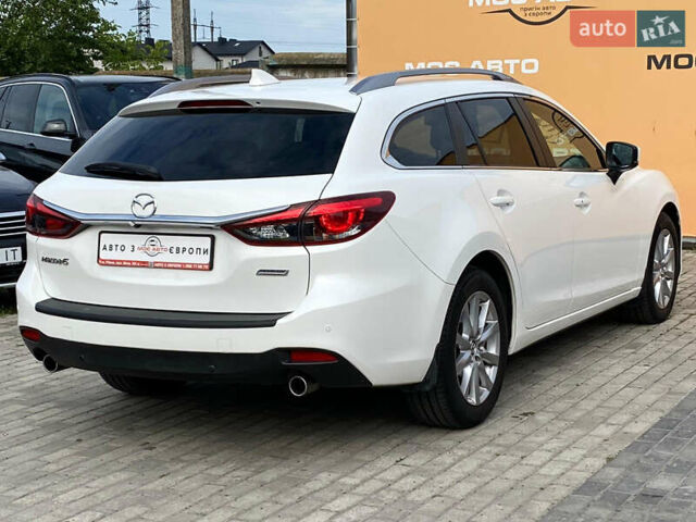 Білий Мазда 6, об'ємом двигуна 2 л та пробігом 130 тис. км за 16700 $, фото 3 на Automoto.ua
