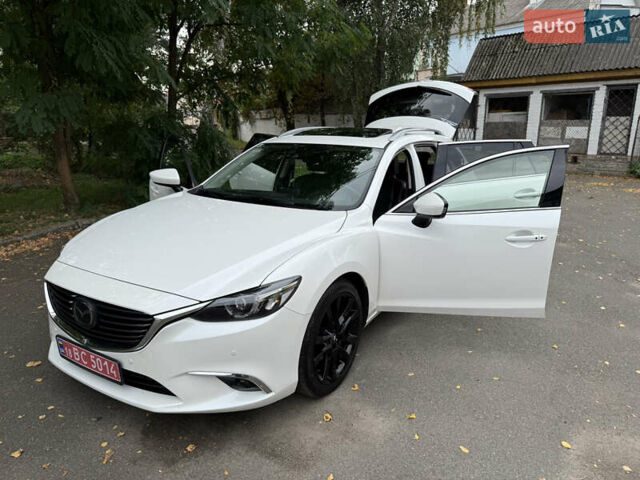 Білий Мазда 6, об'ємом двигуна 2.2 л та пробігом 147 тис. км за 14999 $, фото 140 на Automoto.ua