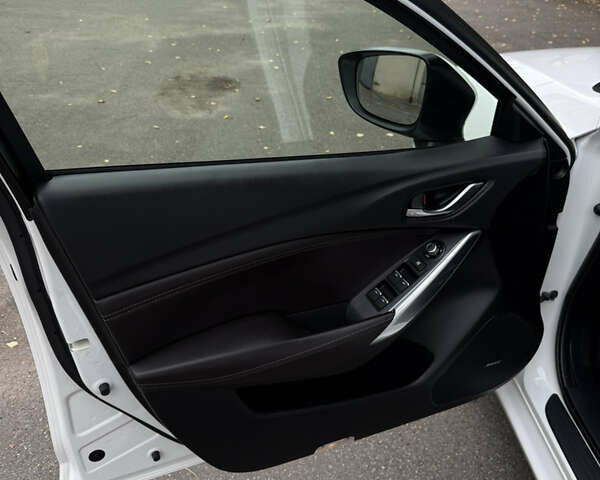 Білий Мазда 6, об'ємом двигуна 2.2 л та пробігом 147 тис. км за 14999 $, фото 50 на Automoto.ua