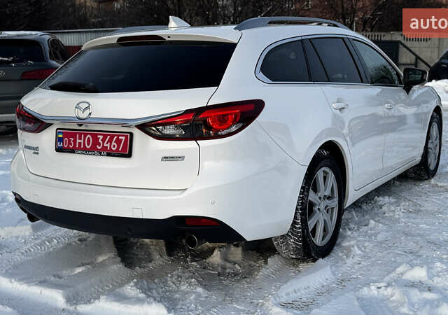 Білий Мазда 6, об'ємом двигуна 2.2 л та пробігом 170 тис. км за 13899 $, фото 6 на Automoto.ua