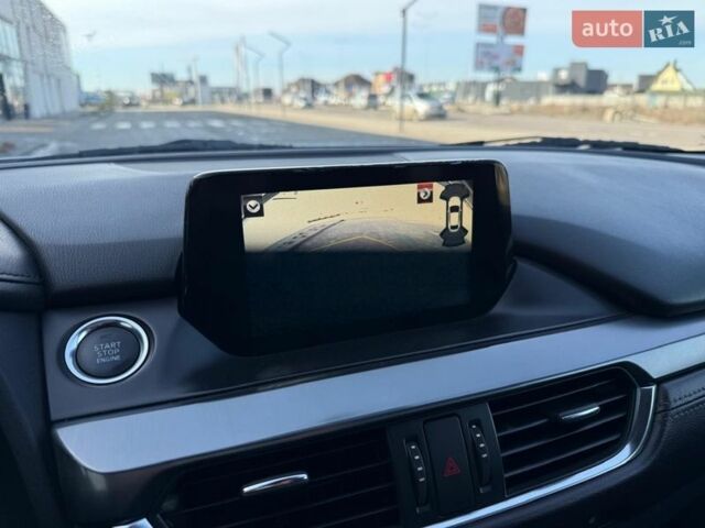 Білий Мазда 6, об'ємом двигуна 2.2 л та пробігом 177 тис. км за 14200 $, фото 43 на Automoto.ua