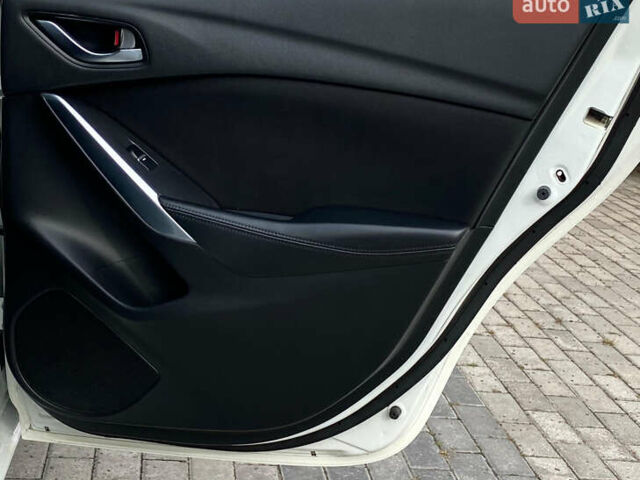 Білий Мазда 6, об'ємом двигуна 2 л та пробігом 130 тис. км за 16700 $, фото 27 на Automoto.ua