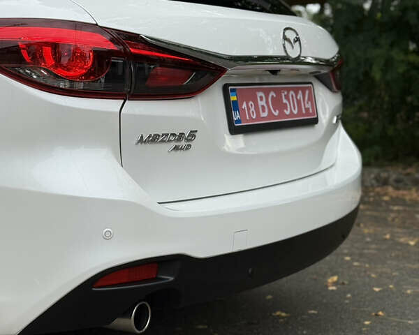 Білий Мазда 6, об'ємом двигуна 2.2 л та пробігом 147 тис. км за 14999 $, фото 30 на Automoto.ua