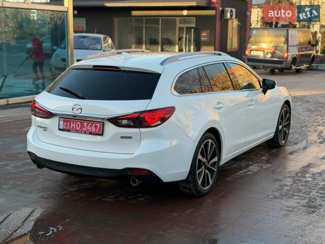 Білий Мазда 6, об'ємом двигуна 2.2 л та пробігом 170 тис. км за 14999 $, фото 12 на Automoto.ua
