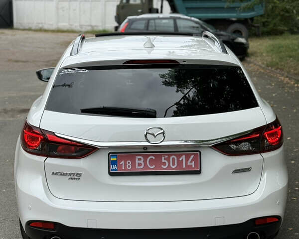 Білий Мазда 6, об'ємом двигуна 2.2 л та пробігом 147 тис. км за 14999 $, фото 3 на Automoto.ua