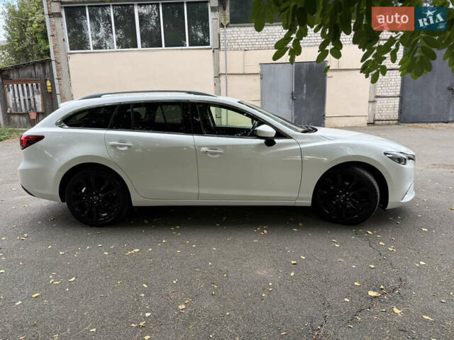 Білий Мазда 6, об'ємом двигуна 2.2 л та пробігом 147 тис. км за 14999 $, фото 6 на Automoto.ua