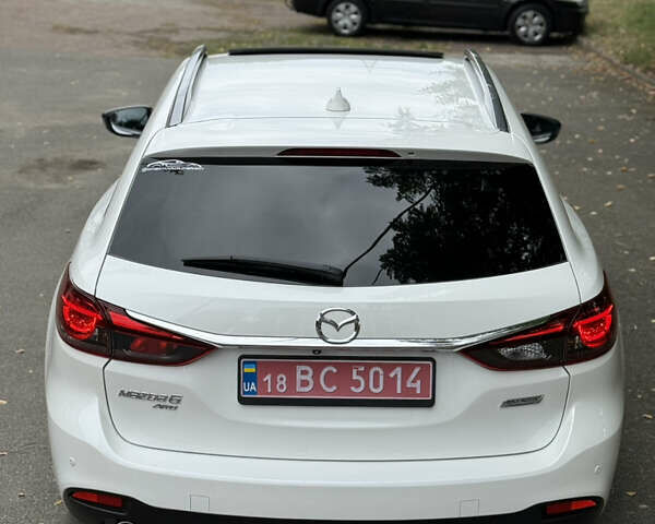 Білий Мазда 6, об'ємом двигуна 2.2 л та пробігом 147 тис. км за 14999 $, фото 4 на Automoto.ua