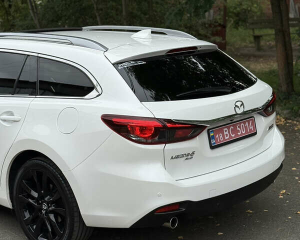 Білий Мазда 6, об'ємом двигуна 2.2 л та пробігом 147 тис. км за 14999 $, фото 29 на Automoto.ua