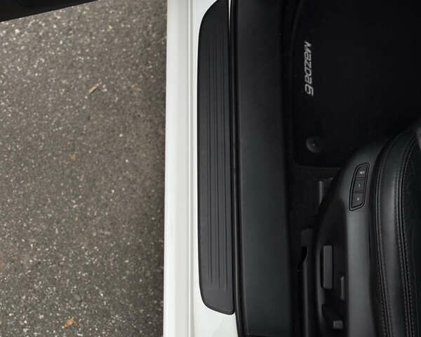 Білий Мазда 6, об'ємом двигуна 2.2 л та пробігом 147 тис. км за 14999 $, фото 59 на Automoto.ua