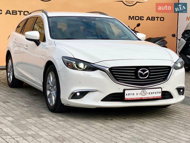 Білий Мазда 6, об'ємом двигуна 2 л та пробігом 130 тис. км за 16700 $, фото 2 на Automoto.ua