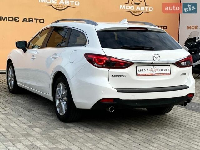 Белый Мазда 6, объемом двигателя 2 л и пробегом 130 тыс. км за 130 $, фото 2 на Automoto.ua
