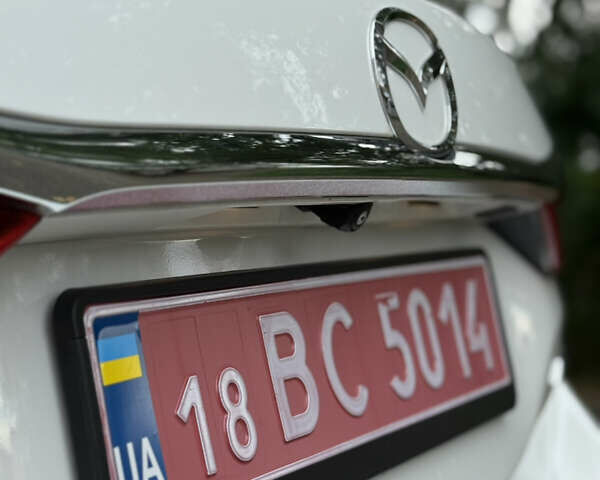 Білий Мазда 6, об'ємом двигуна 2.2 л та пробігом 147 тис. км за 14999 $, фото 41 на Automoto.ua