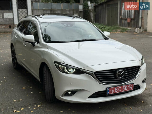 Білий Мазда 6, об'ємом двигуна 2.2 л та пробігом 147 тис. км за 14999 $, фото 7 на Automoto.ua