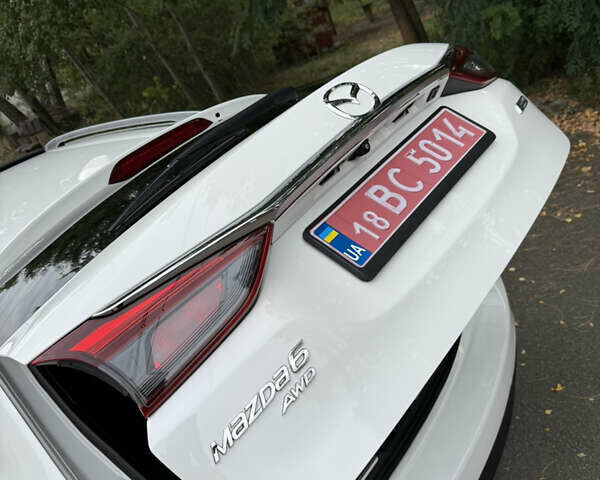 Білий Мазда 6, об'ємом двигуна 2.2 л та пробігом 147 тис. км за 14999 $, фото 103 на Automoto.ua