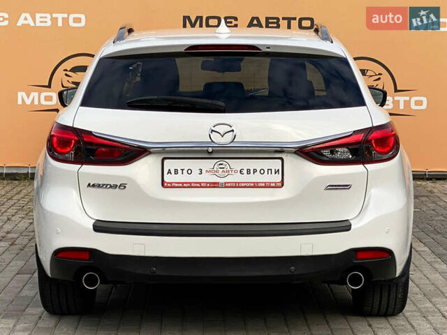 Білий Мазда 6, об'ємом двигуна 2 л та пробігом 130 тис. км за 16700 $, фото 4 на Automoto.ua