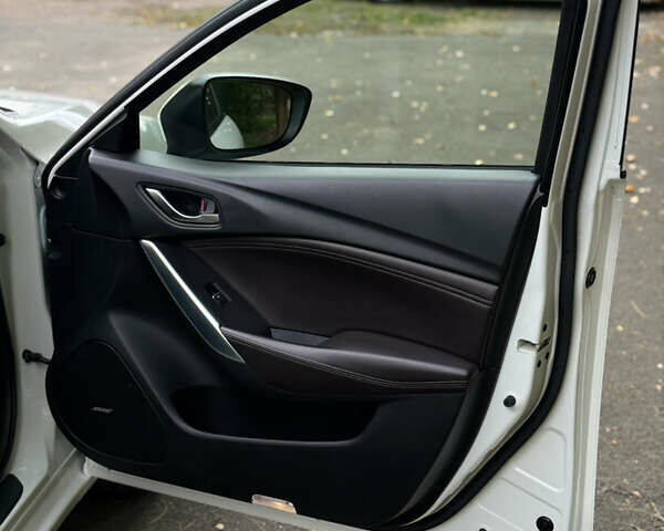 Білий Мазда 6, об'ємом двигуна 2.2 л та пробігом 147 тис. км за 14999 $, фото 118 на Automoto.ua