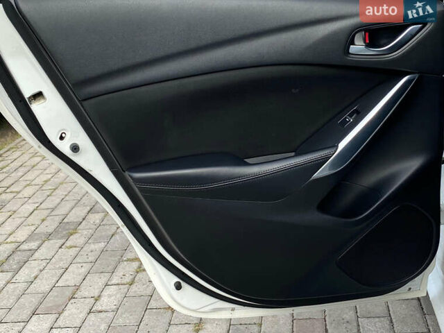 Білий Мазда 6, об'ємом двигуна 2 л та пробігом 130 тис. км за 16700 $, фото 29 на Automoto.ua