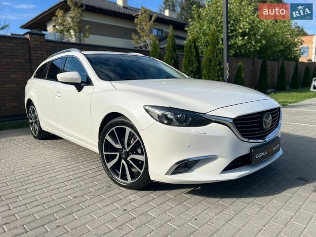 Білий Мазда 6, об'ємом двигуна 2.2 л та пробігом 176 тис. км за 13499 $, фото 2 на Automoto.ua