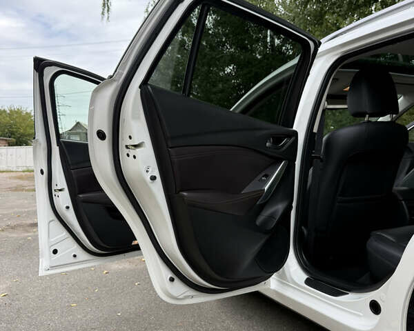 Білий Мазда 6, об'ємом двигуна 2.2 л та пробігом 147 тис. км за 14999 $, фото 141 на Automoto.ua
