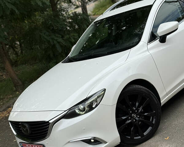 Білий Мазда 6, об'ємом двигуна 2.2 л та пробігом 147 тис. км за 14999 $, фото 14 на Automoto.ua