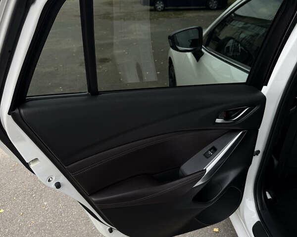 Білий Мазда 6, об'ємом двигуна 2.2 л та пробігом 147 тис. км за 14999 $, фото 92 на Automoto.ua