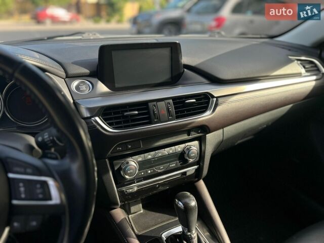 Білий Мазда 6, об'ємом двигуна 2.2 л та пробігом 176 тис. км за 13499 $, фото 19 на Automoto.ua