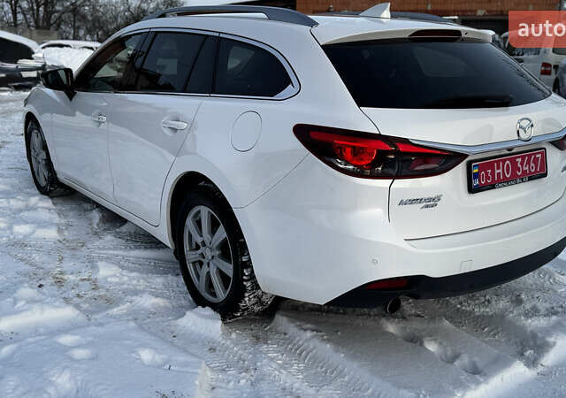 Білий Мазда 6, об'ємом двигуна 2.2 л та пробігом 170 тис. км за 13899 $, фото 8 на Automoto.ua