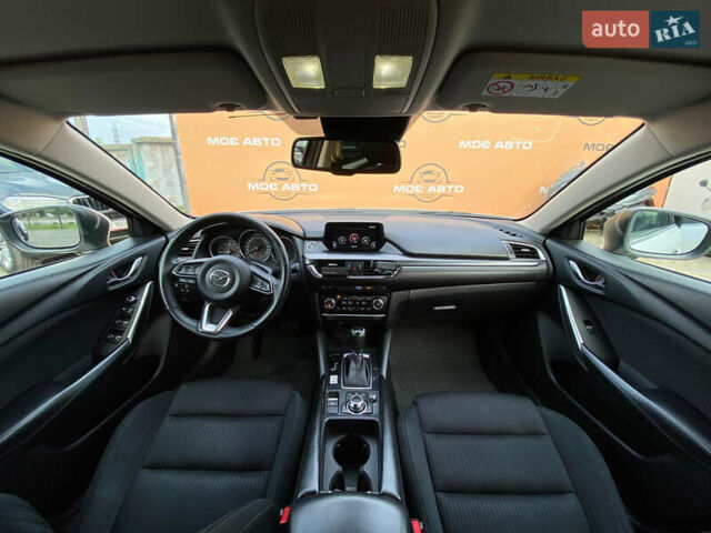 Білий Мазда 6, об'ємом двигуна 2 л та пробігом 130 тис. км за 16700 $, фото 12 на Automoto.ua