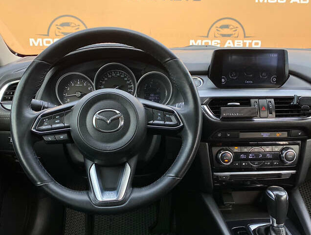 Білий Мазда 6, об'ємом двигуна 2 л та пробігом 130 тис. км за 16700 $, фото 13 на Automoto.ua