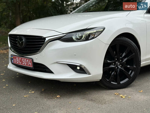 Білий Мазда 6, об'ємом двигуна 2.2 л та пробігом 147 тис. км за 14999 $, фото 15 на Automoto.ua