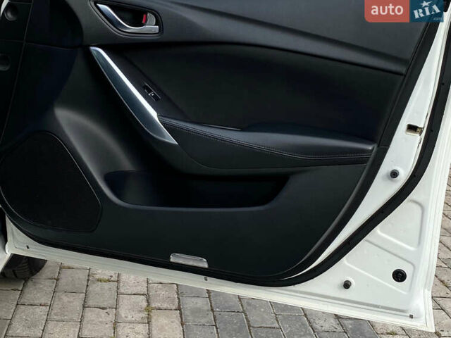 Білий Мазда 6, об'ємом двигуна 2 л та пробігом 130 тис. км за 16700 $, фото 26 на Automoto.ua
