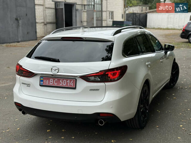 Білий Мазда 6, об'ємом двигуна 2.2 л та пробігом 147 тис. км за 14999 $, фото 5 на Automoto.ua