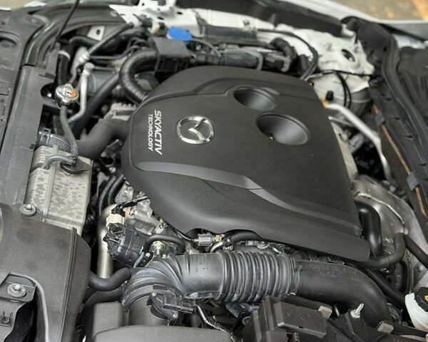 Білий Мазда 6, об'ємом двигуна 2.2 л та пробігом 147 тис. км за 14999 $, фото 136 на Automoto.ua