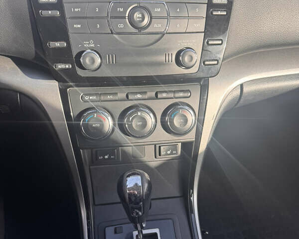 Білий Мазда 6, об'ємом двигуна 2 л та пробігом 177 тис. км за 8900 $, фото 12 на Automoto.ua