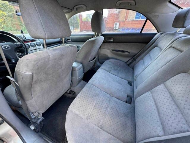Бежевий Мазда 6, об'ємом двигуна 2 л та пробігом 250 тис. км за 1350 $, фото 11 на Automoto.ua