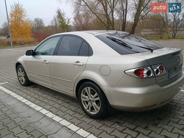 Бежевий Мазда 6, об'ємом двигуна 2 л та пробігом 130 тис. км за 4499 $, фото 9 на Automoto.ua