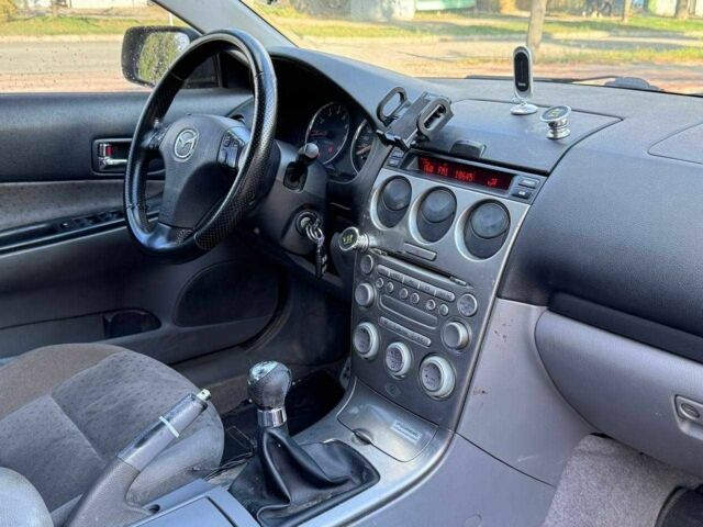 Бежевий Мазда 6, об'ємом двигуна 2 л та пробігом 250 тис. км за 1350 $, фото 9 на Automoto.ua