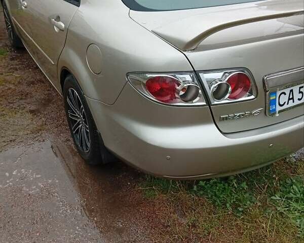 Бежевий Мазда 6, об'ємом двигуна 2 л та пробігом 213 тис. км за 3600 $, фото 7 на Automoto.ua