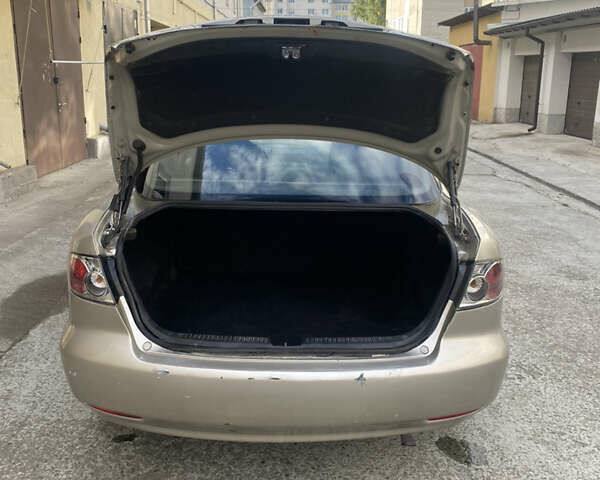 Бежевий Мазда 6, об'ємом двигуна 2 л та пробігом 420 тис. км за 2950 $, фото 7 на Automoto.ua