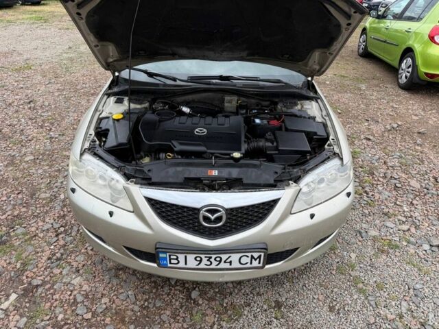 Бежевий Мазда 6, об'ємом двигуна 2 л та пробігом 256 тис. км за 3750 $, фото 7 на Automoto.ua
