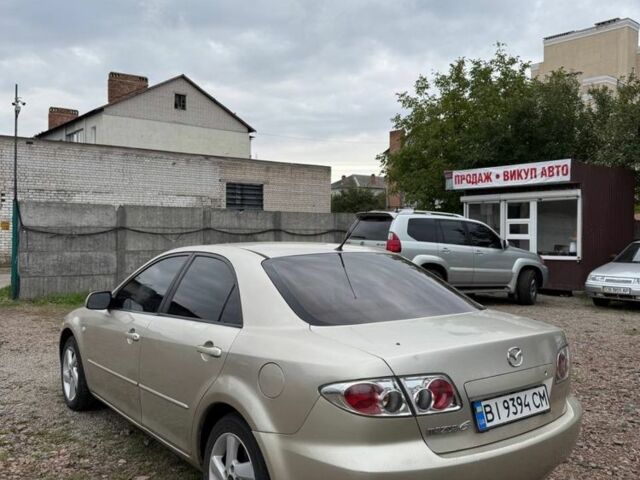 Бежевий Мазда 6, об'ємом двигуна 2 л та пробігом 256 тис. км за 3750 $, фото 5 на Automoto.ua