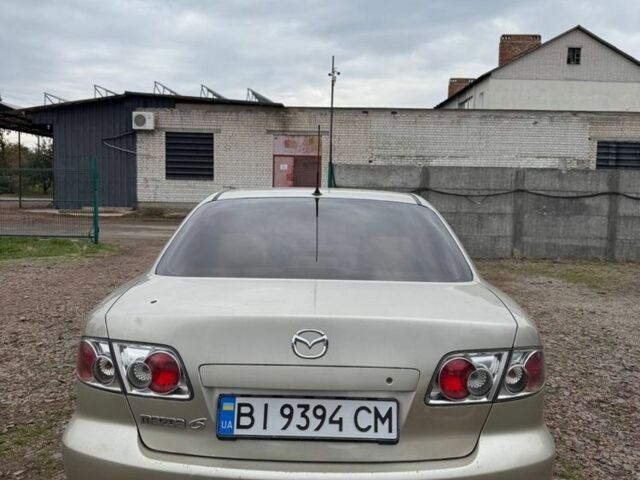 Бежевий Мазда 6, об'ємом двигуна 2 л та пробігом 256 тис. км за 3750 $, фото 4 на Automoto.ua