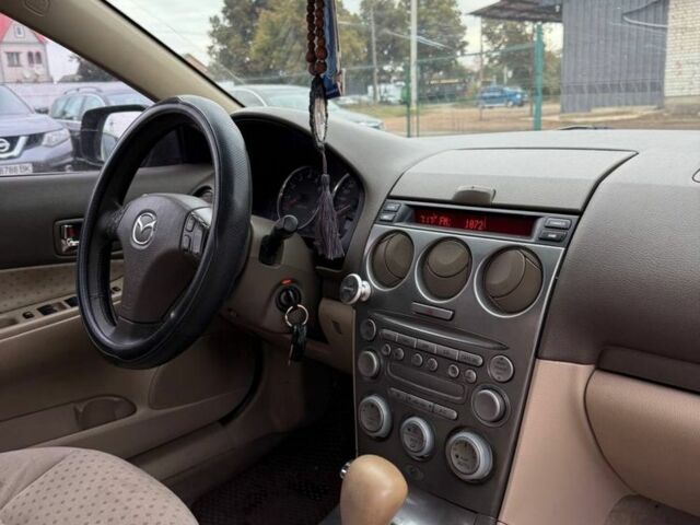 Бежевий Мазда 6, об'ємом двигуна 2 л та пробігом 256 тис. км за 3750 $, фото 9 на Automoto.ua