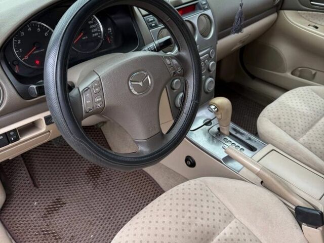 Бежевий Мазда 6, об'ємом двигуна 2 л та пробігом 256 тис. км за 3750 $, фото 8 на Automoto.ua