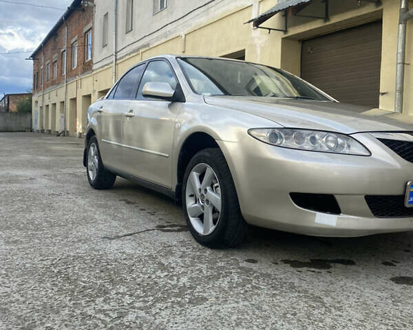 Бежевий Мазда 6, об'ємом двигуна 2 л та пробігом 420 тис. км за 2950 $, фото 5 на Automoto.ua